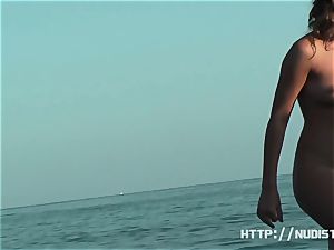 An great spy webcam nude beach voyeur video