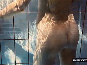 scorching ample jugged nubile Lera swimming in the pool